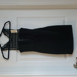 Little black dress with sheer plunging neck and back